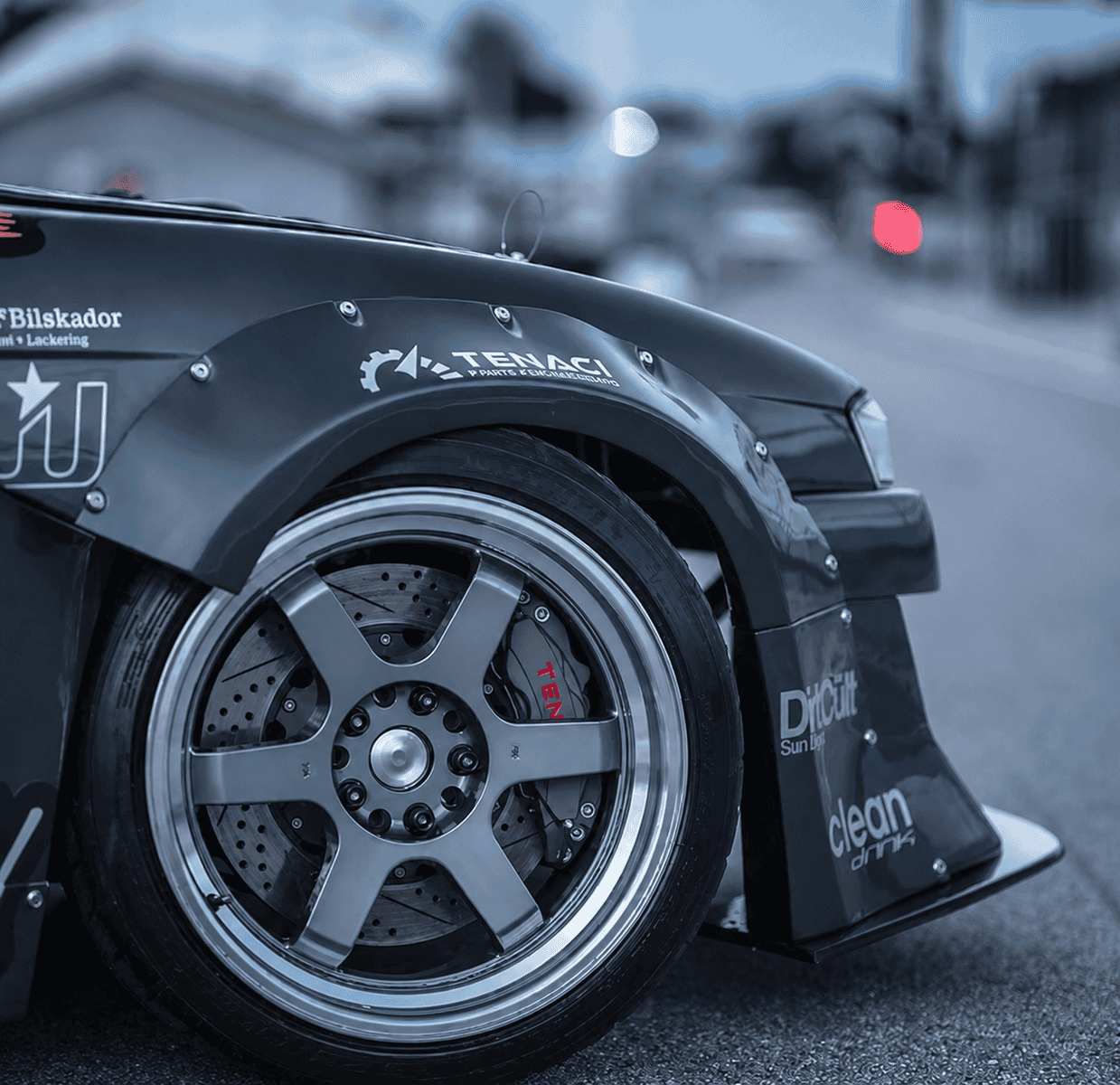 Tenaci brake kit behind the alloy wheel of a drift car
